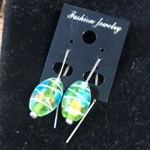 Handmade glass bead earrings for pierced ears on a silver thread